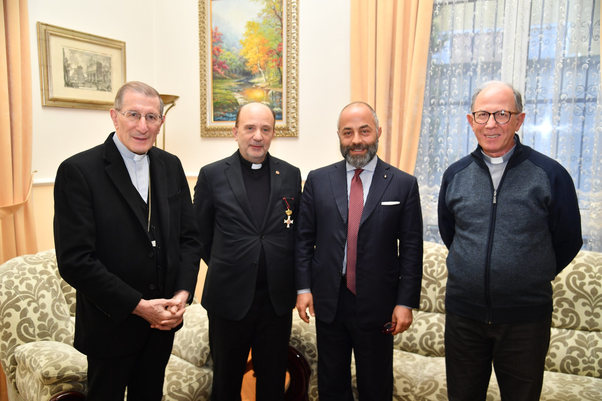 Ambassador conferres high honour on Former Director of Caritas Albania Father Antonio Leuci